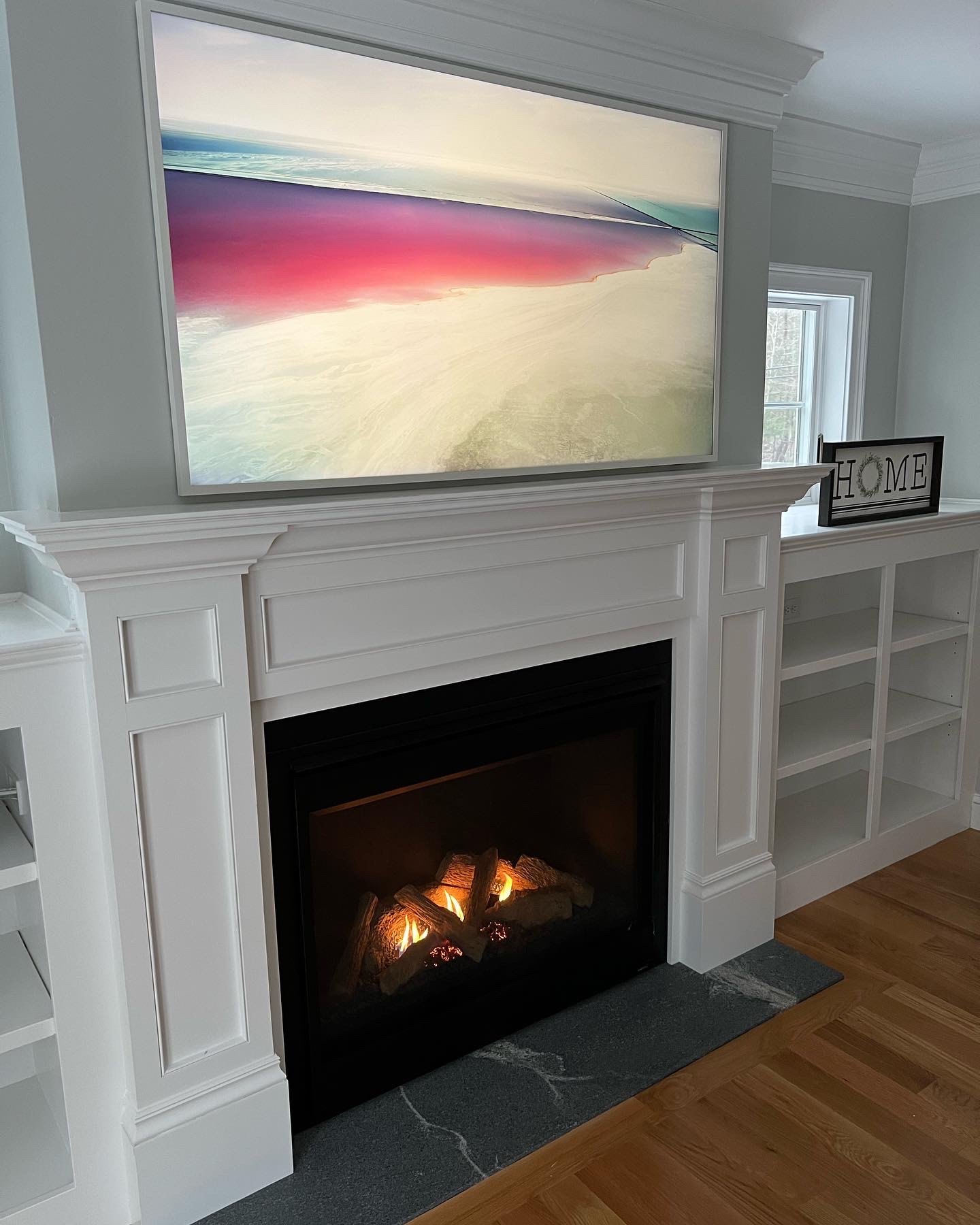 frame tv fireplace